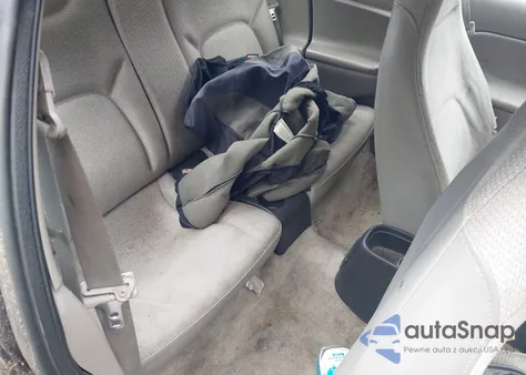 1999 Saturn Sc1 z USA, uszkodzony, nr VIN 1G8ZP1284XZ348752